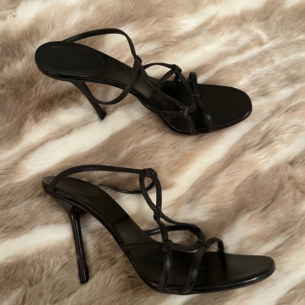 Stunning and ultra sexy Gucci black stiletto snakeskin sandals.